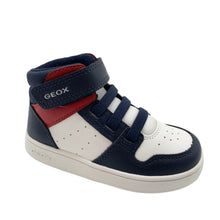 Load image into Gallery viewer, Navy and white high-top sneaker with red accents on a light gray background