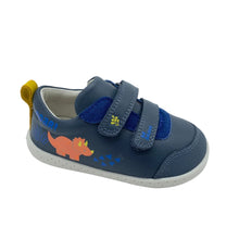 Load image into Gallery viewer, A toddler's navy blue slip-on shoe with two hook-and-loop straps, featuring a colorful orange dinosaur graphic and blue text on the side, set against a plain white background.