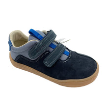 Load image into Gallery viewer, A child's barefoot shoe with double velcro fastenings. The shoe is primarily navy blue with artic blue accents and a tan sole.