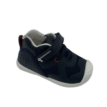 Load image into Gallery viewer, A navy-colored Biomechanics Trainer with a white sole and red detailing, featuring a leather lining and a Velcro fastening.