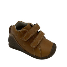 Load image into Gallery viewer, A tan biomechanic baby shoe with a double velcro strap and a flat sole.