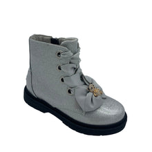 Load image into Gallery viewer, A silver glittery girls' boot with ribbon laces and a fuzzy bear charm, designed with a side zipper and leather insole.