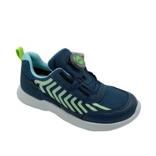 Load image into Gallery viewer, A navy blue kids' sneaker with a light blue collar, a gray and green dial closure system, and lime green chevron accents on the side, set against a plain white studio background.
