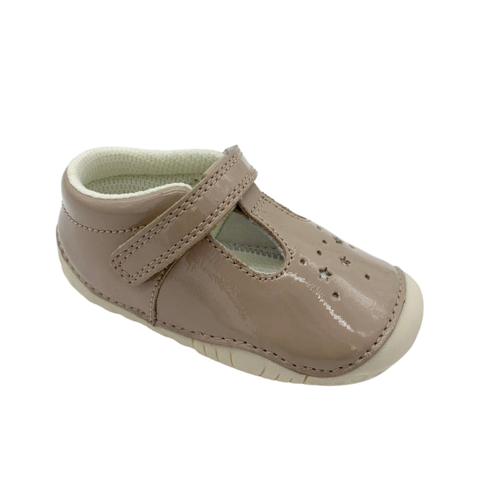 Beige children's shoe with a strap on a white background