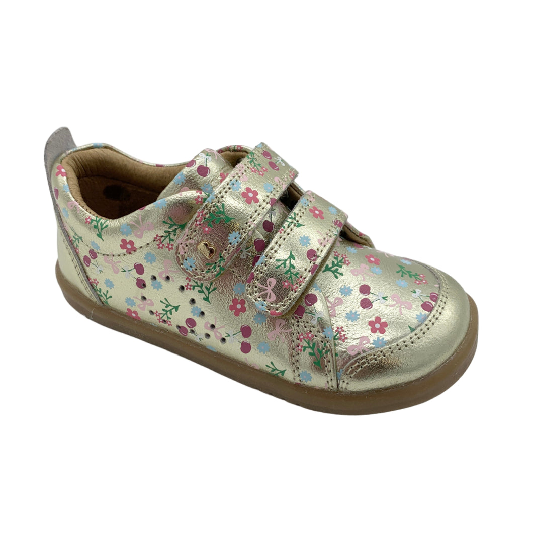 Floral-patterned children's shoe on a white background