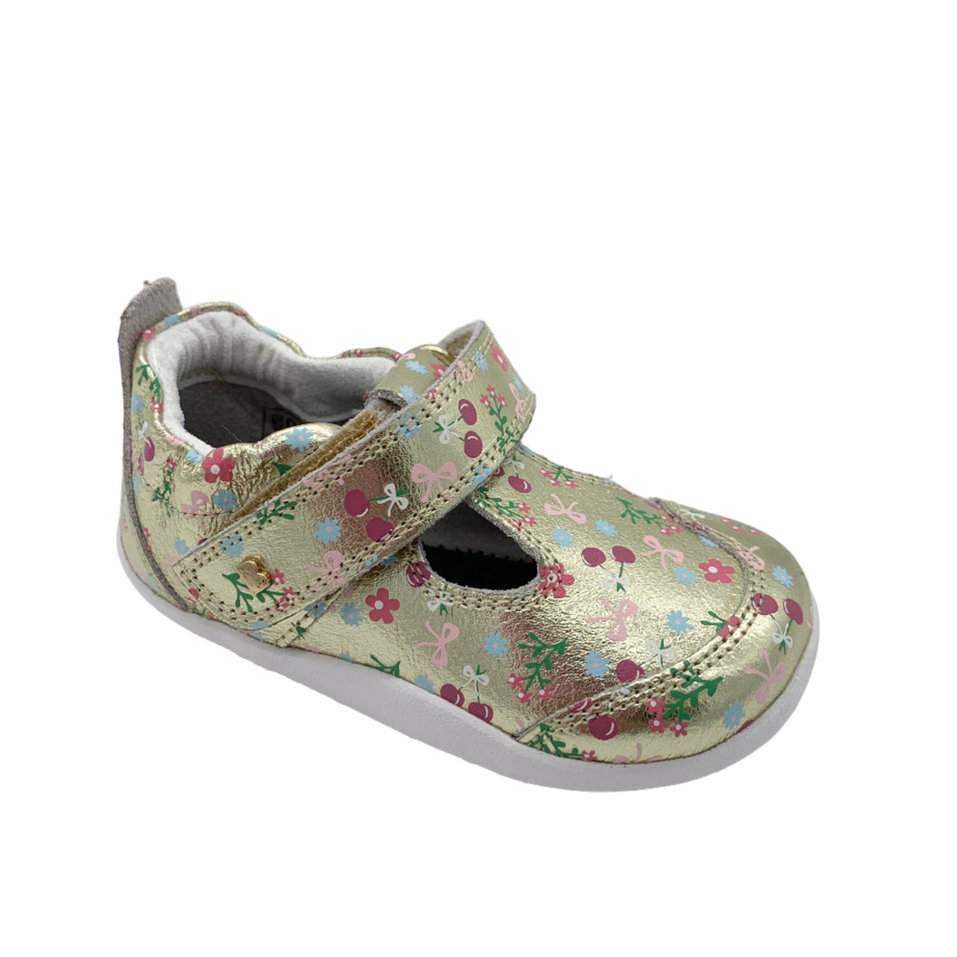 Floral-patterned children's shoe on a white background