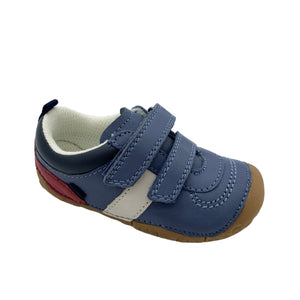 Blue children's shoe with velcro straps on a white background