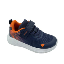 Load image into Gallery viewer, A Geox toddler sneaker in navy blue and orange, featuring a hook-and-loop strap, elastic laces, and a white textured sole, photographed on a white studio background.
