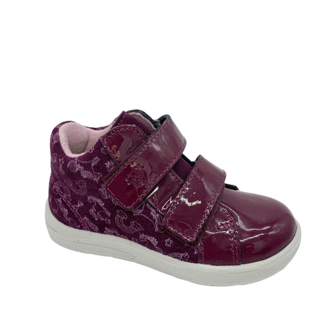 Purple children's shoe with velcro straps on a white background