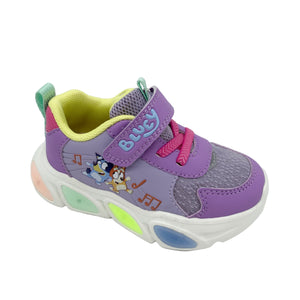 Colorful children's sneaker with cartoon characters on a white background