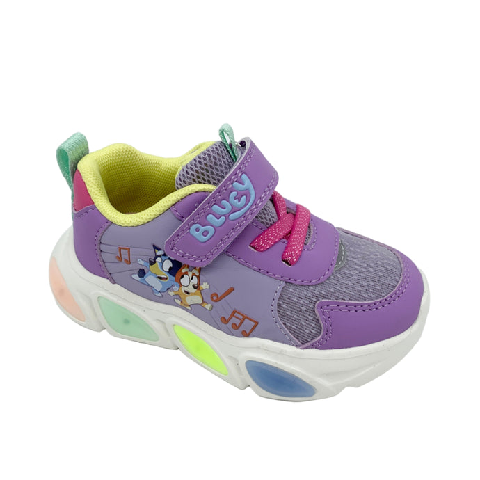 Colorful children's sneaker with cartoon characters on a white background