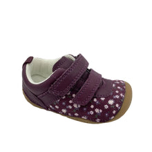 Load image into Gallery viewer, A single toddler's slip-on shoe in deep purple, featuring a floral pattern on the toe, two hook-and-loop straps, and a light brown rubber sole, shown on a white background.
