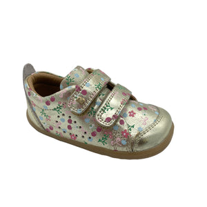 Floral-patterned children's shoe on a white background