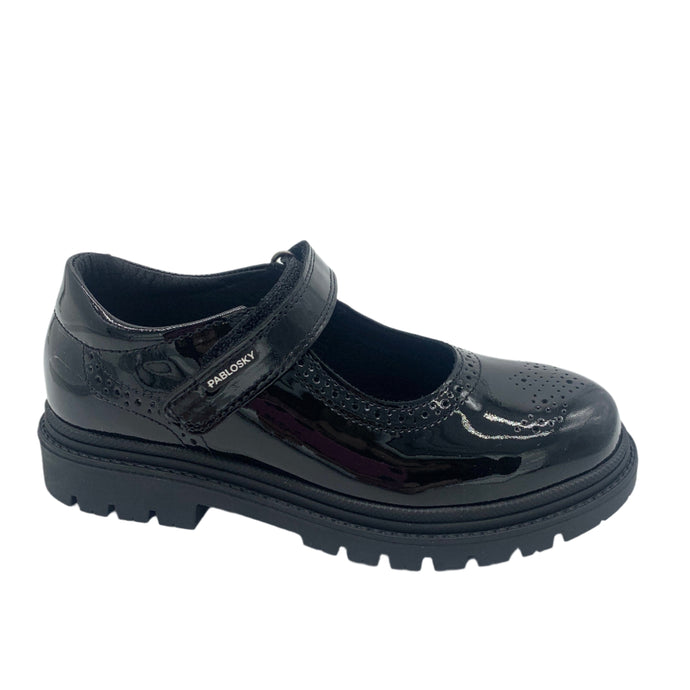 Black shoe with a strap on a white background