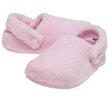 Load image into Gallery viewer, A pair of soft pink plush slip-on slippers with a fuzzy sherpa texture, shown against a solid black background.
