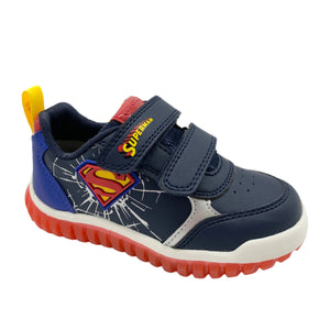 Navy blue children's shoe with Superman logo on a white background