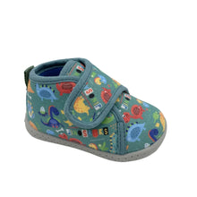 Load image into Gallery viewer, A toddler's canvas slip-on shoe featuring a colorful dinosaur pattern on a teal background, with hook-and-loop straps and a gray sole, photographed on a light gray studio background.
