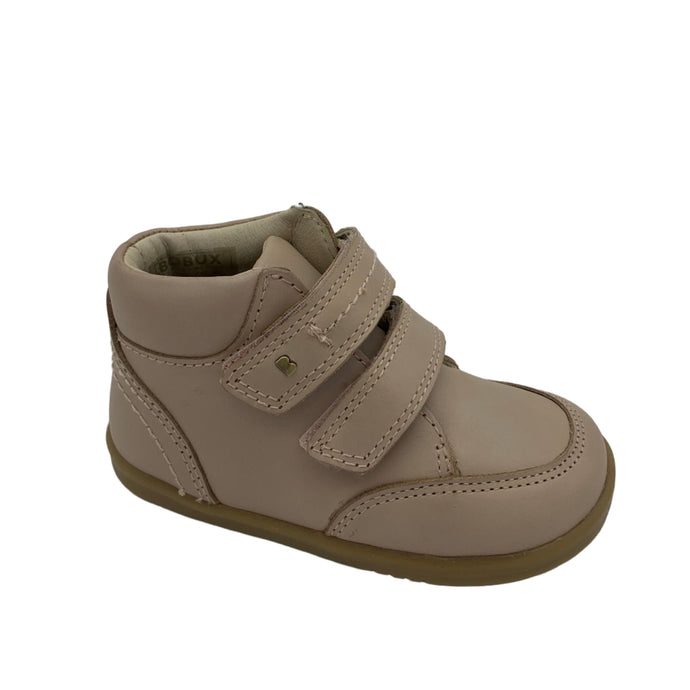 A dusky pink Bobux Timber Ankle Boot with a pearlised finish and double velcro straps on a white background.