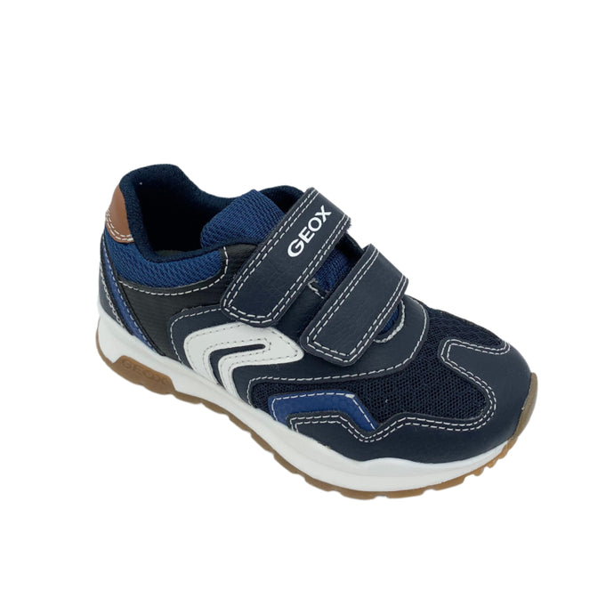 A navy and tan Geox Pavel running trainer with a breathable footbed and double velcro fastening, designed for boys.