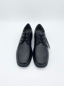 black leather shoe