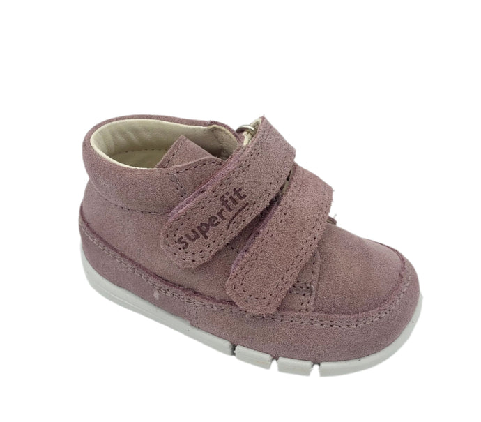 A pink Superfit Flexy baby shoe with double velcro fastening and a flexible sole.